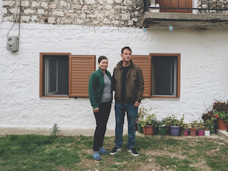 Demir Murataj, 59 and his wife at their house in Kutë.